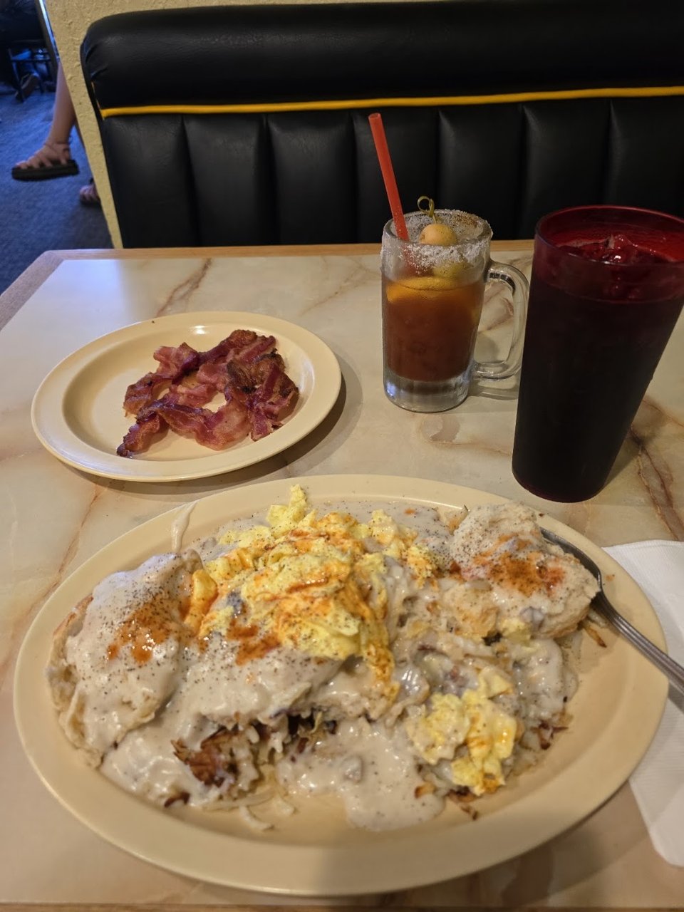 Breakfast menu with omelettes and sandwiches.