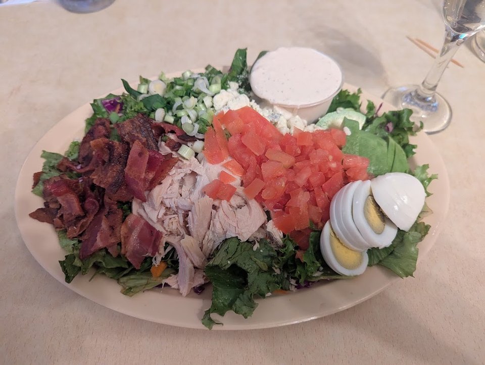 Menu page with salads and sides.