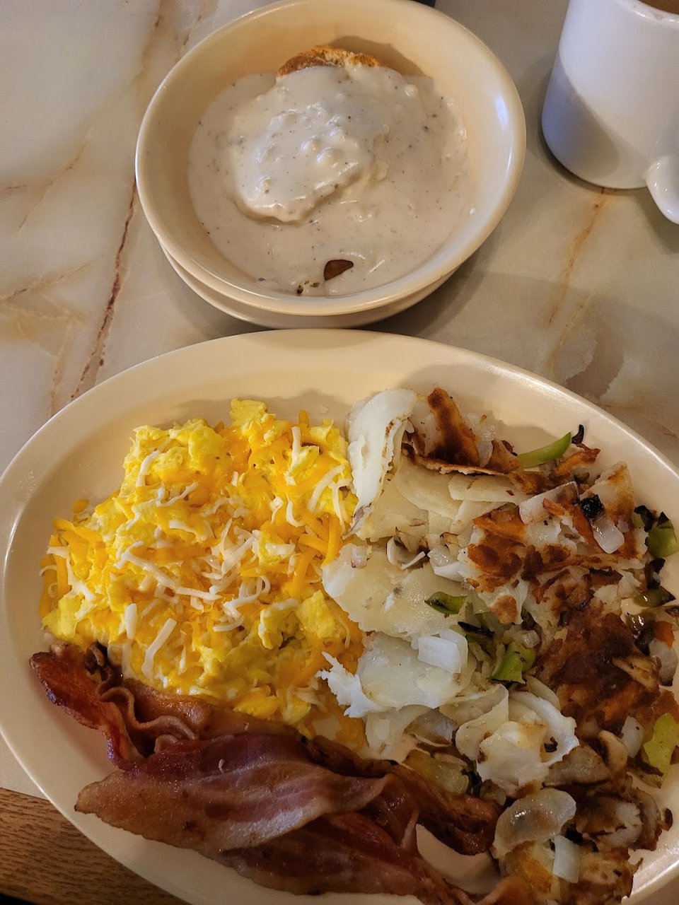 Breakfast menu with omelettes and sandwiches.