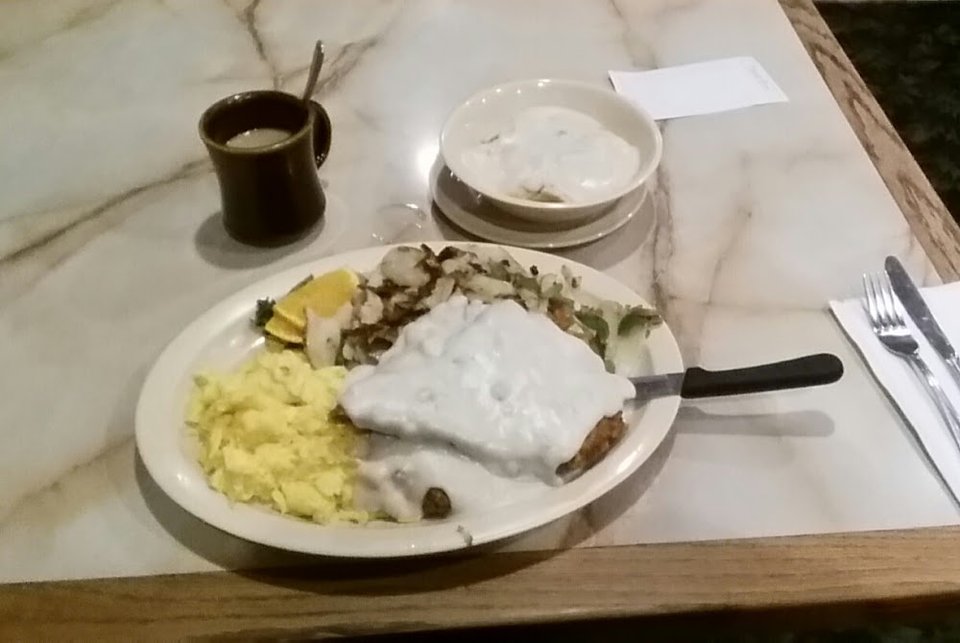 Printed menu featuring American lunch plates.